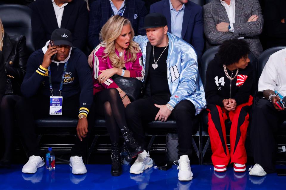 Jenny McCarthy and Donnie Wahlberg attend the 2024 NBA All-Star Game at Gainbridge Fieldhouse on February 18, 2024 in Indianapolis, Indiana