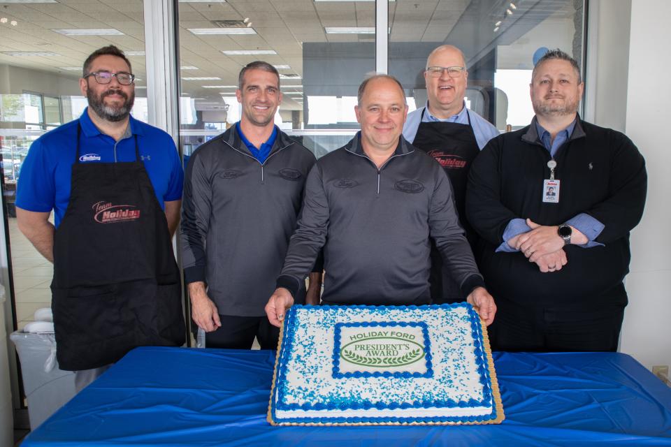 Holiday Ford celebrated being named a Ford President’s Award winner with a team cookout. Pictured are, from left, Willie Beyer, VP of Fixed Operations; Tony Mathos, VP/General Sales Manager; Tim Foulk, Service Manager; Thor Gilbertson, CEO; and Shane Rosalez, Sales Manager