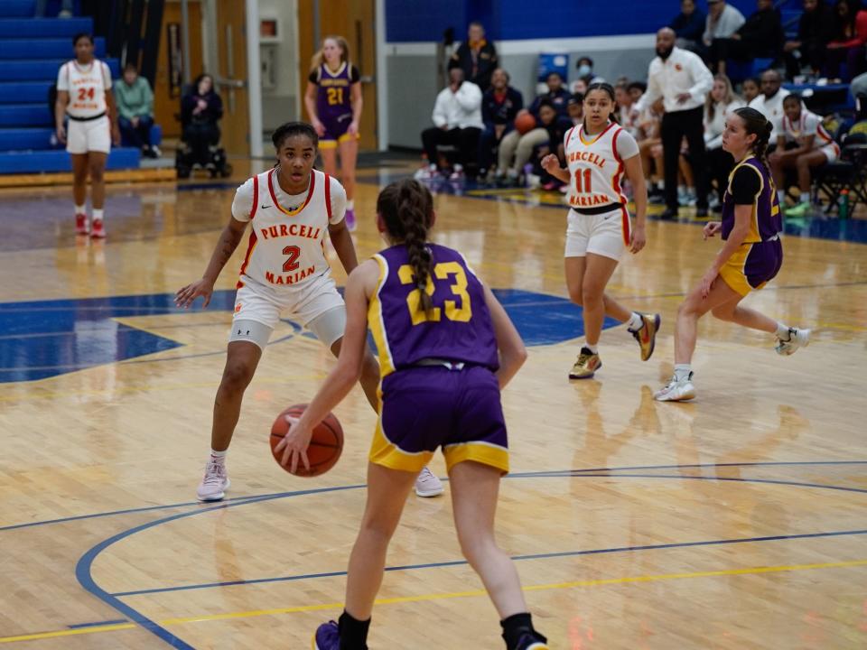 Thanks to her defensive pressure, Purcell Marian's Dee Alexander (2) grabbed six steals in a Division II regional semifinal win over Bloom-Carroll on March 5, 2024 at Springfield High School.