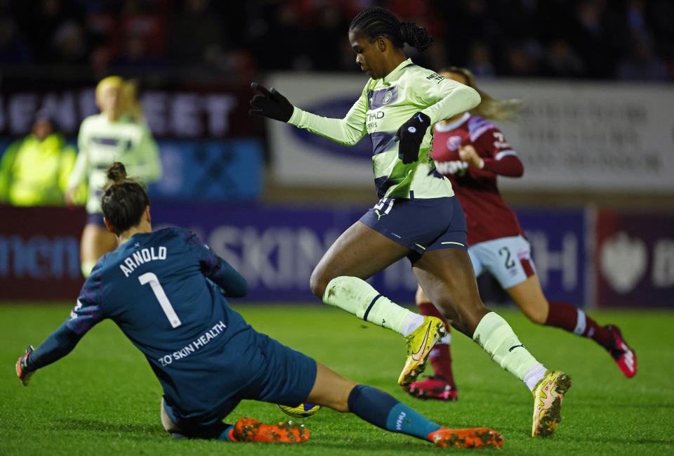 Manchester City's Khadija Shaw scores their first goal past West Ham United's Mackenzie Arnold Action Images via Reuters/John Sibley