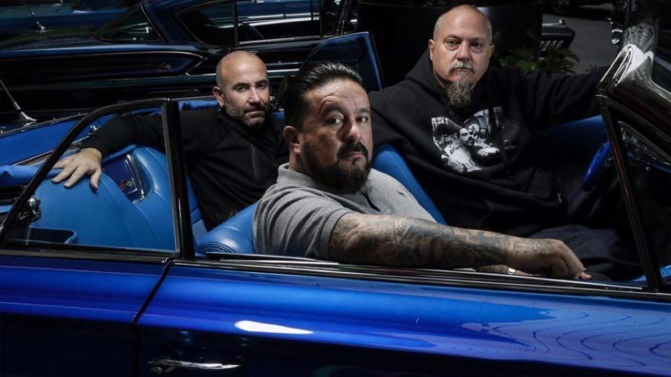 Portrait of Mister Cartoon, center, Estevan Oriol, right, and Ricardo de Montreuill, of "Lowriders.