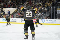 Vegas Golden Knights defenseman Alec Martinez (23) celebrates after scoring against the Montreal Canadiens during the second period in Game 1 of an NHL hockey Stanley Cup semifinal playoff series Monday, June 14, 2021, in Las Vegas. (AP Photo/John Locher)