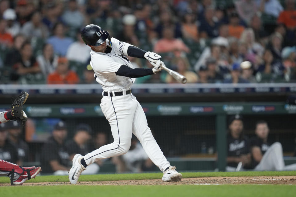 Detroit Tigers' Zack Short hits a two-run single against the Minnesota Twins in the eighth inning of a baseball game, Tuesday, Aug. 8, 2023, in Detroit. (AP Photo/Paul Sancya)