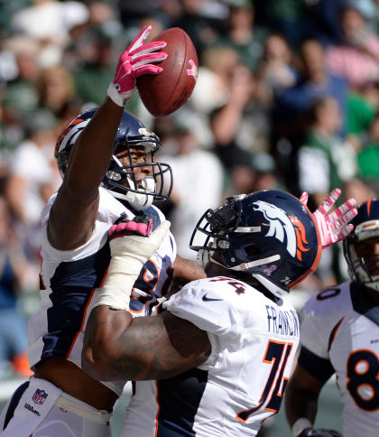 Demaryius Thomas celebrates scoring a touchdown with Orlando Franklin. (USA Today Sports)