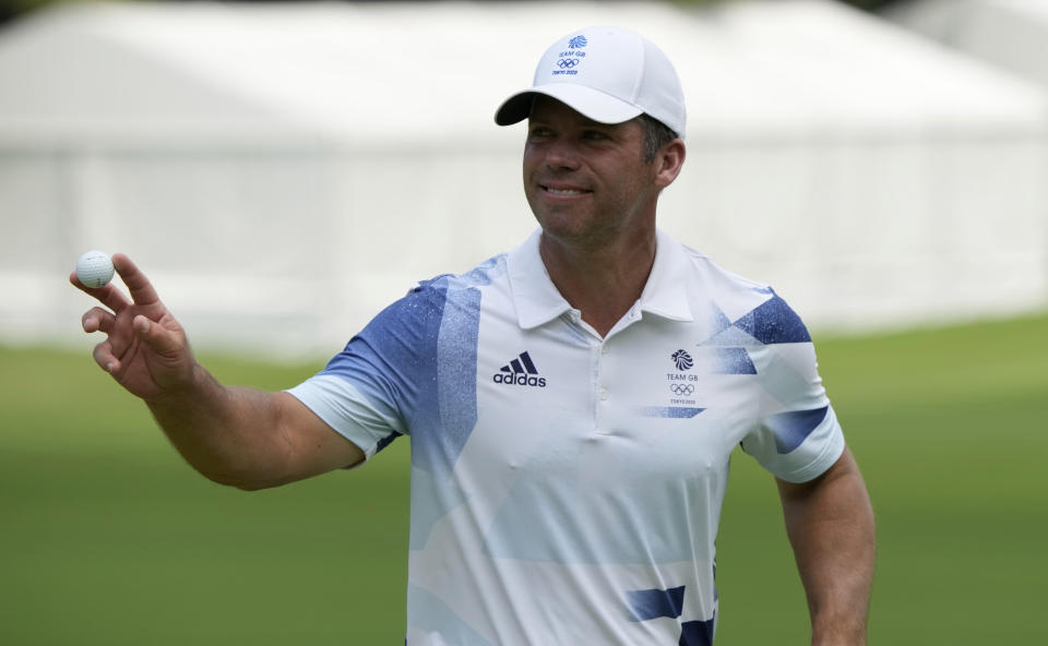 Paul Casey of Great Britain reacts after make a putt on the first hole during the third round of the men's golf event at the 2020 Summer Olympics on Saturday, July 31, 2021, in Kawagoe, Japan. (AP Photo/Andy Wong)