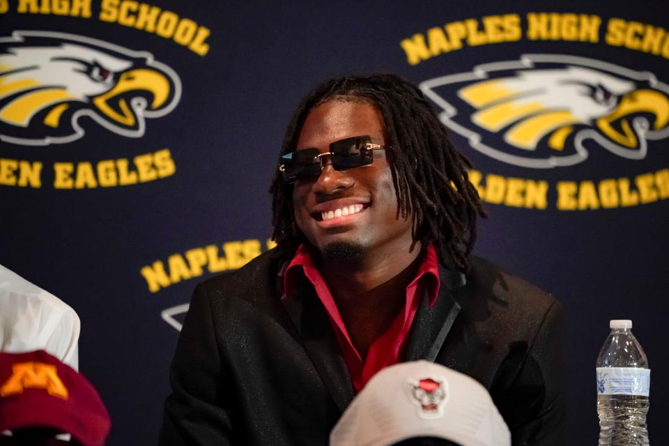 Naples running back Kendrick Raphael smiles during an early signing celebration at Naples High School in Naples on Thursday, Dec. 15, 2022. 