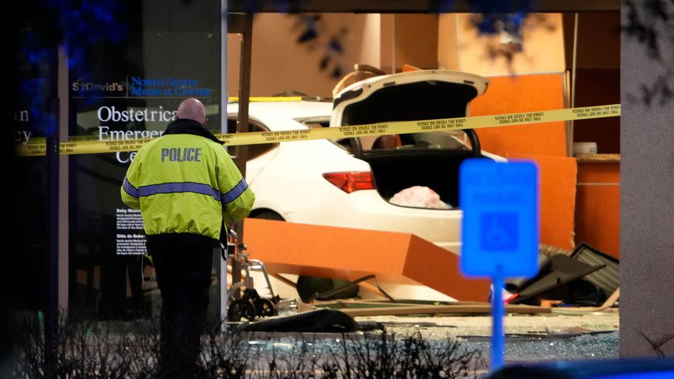 Police investigate Tuesday after a car drove into the lobby of the emergency room at St. David's North Austin Medical Center in Austin, Texas. - Jay Janner/Austin American-Statesman/USA Today Network