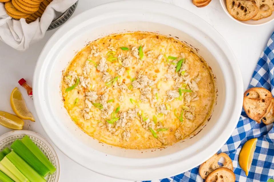 <p>The Magical Slow Cooker</p><p>With lump crab meat and not one, not two, not three, but FOUR types of cheeses, this will have your guests drooling.</p><p><strong>Get the recipe: <a href="https://www.themagicalslowcooker.com/crab-dip/" rel="nofollow noopener" target="_blank" data-ylk="slk:Slow Cooker Crab Dip;elm:context_link;itc:0;sec:content-canvas" class="link ">Slow Cooker Crab Dip</a></strong></p>