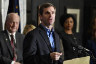 Kentucky Governor-Elect Andy Beshear introduces his transition team in the State Capitol Rotunda in Frankfort, Ky., Friday, Nov. 15, 2019. Beshear says it’s time for Kentuckians to come together now that his tough race against Republican Gov. Matt Bevin has concluded. (AP Photo/Timothy D. Easley)