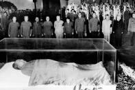 FILE - In this Sept. 13, 1976, file photo, party and state leaders stand vigil before the remains of leader of Mao Zedong, in China. Mao died at age 82. (AP Photo, File)