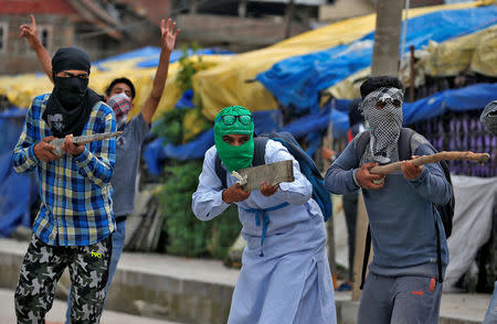 Stone pelters clash with police during disturbances in Srinagar, Kashmir, India May 19, 2017. Picture taken May 19, 2017. REUTERS/Cathal McNaughton