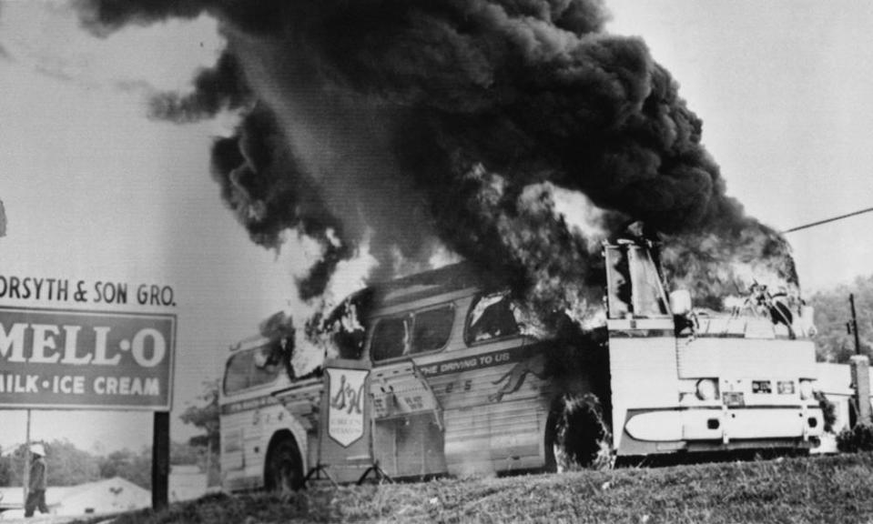 A Freedom Rider bus in flames in May 1961 near Anniston, Alabama.