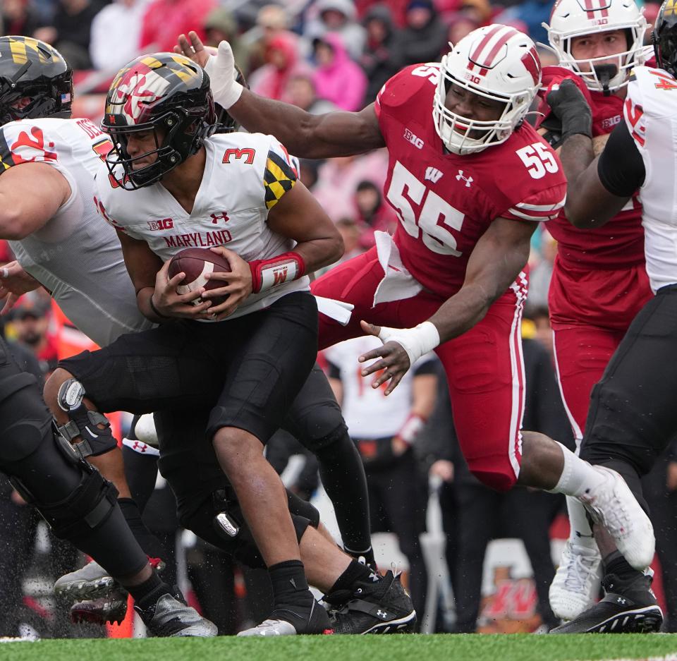 Wisconsin linebacker Maema Njongmeta pressures Maryland quarterback Taulia Tagovailoa during their game Nov. 5. Njongmeta will be among those counted on by the Badgers to help fill voids on defense for the Guaranteed Rate Bowl.