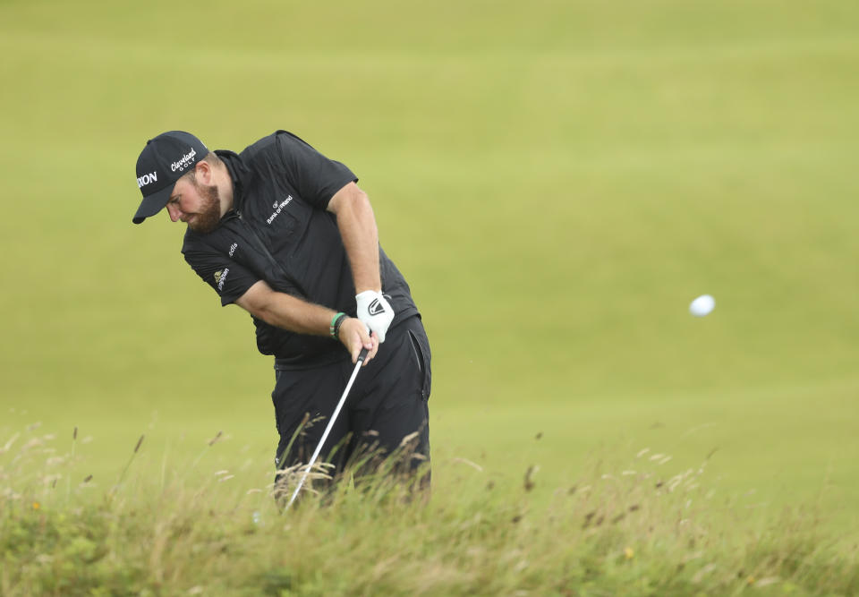 FILE - Ireland's Shane Lowry plays a shot from the 8th fairway during the final round of the British Open Golf Championships at Royal Portrush in Northern Ireland, Sunday, July 21, 2019. Lowry says this shot gave him confidence he could handle any shot in the final round. (AP Photo/Peter Morrison)