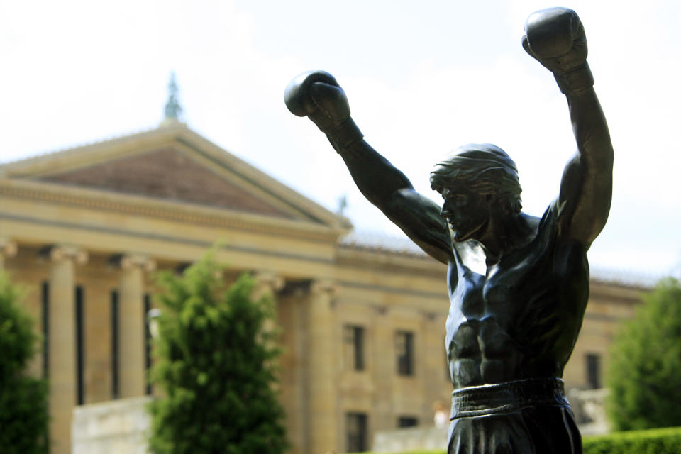 The bronze statue of Sylvester Stallone portraying the boxer from the film “Rocky III” is seen shortly after workers installed it near the steps of the Philadelphia Museum of Art in Philadelphia. (AP Photo/Matt Rourke)