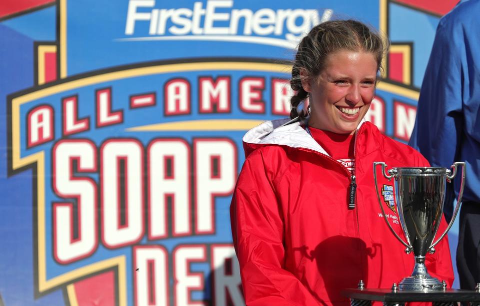 Karlye Murphy of Hilton, N.Y.,  is all smiles after winning the rally super stock championship Saturday, making her the first person ever to win four All-American Soap Box Derby titles.