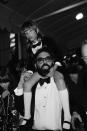 <p>Director Francis Ford Coppola carries his daughter on his shoulders at the Cannes Film Festival in 1979. </p>