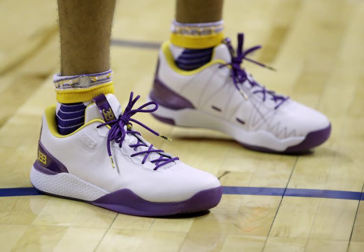 LeBron James Suits Up in Louis Vuitton Derby Shoes at Lakers Game –  Footwear News