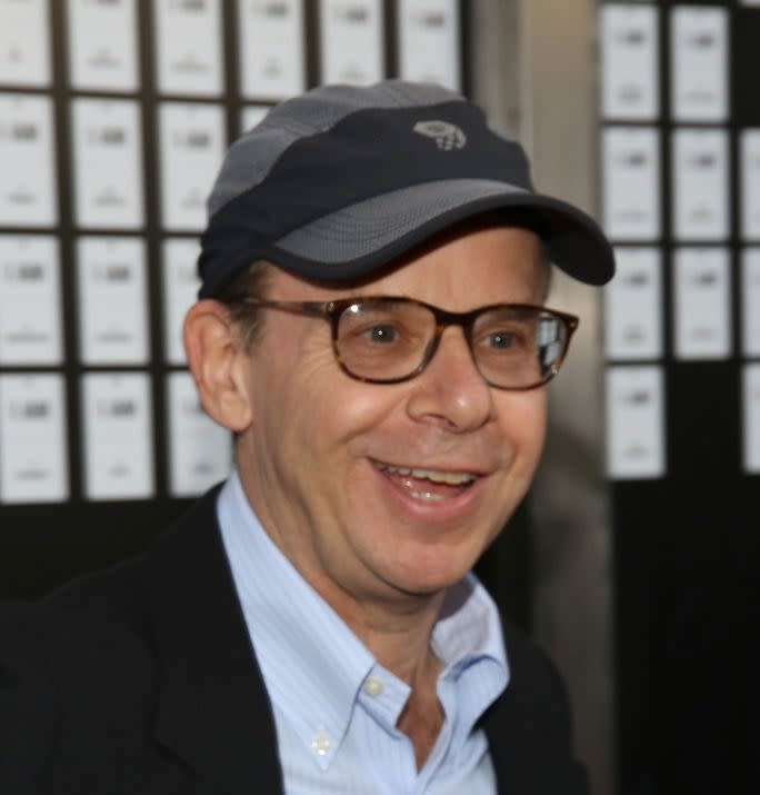 Rick Moranis smiling