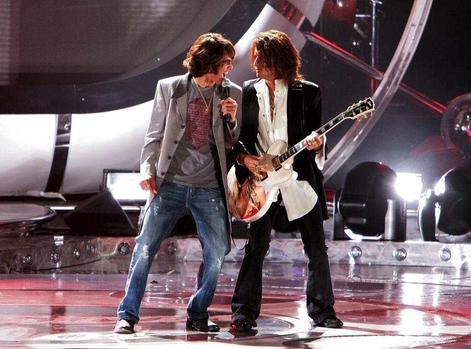 Sanjaya and Joe Perry of Aerosmith perform on the 6th season of American Idol.