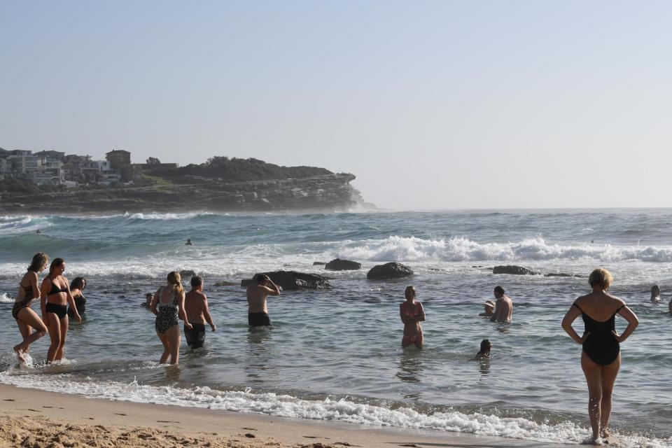 Beachgoers cool off at Bronte Beach in Sydney (EPA)