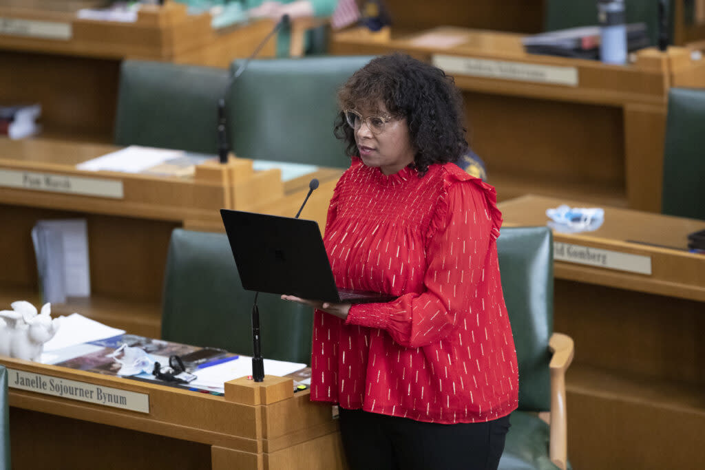 Rep. Janelle Bynum, D-Clackamas, works on the House floor at the Oregon state Capitol in Salem on Tuesday, Feb. 28, 2023.