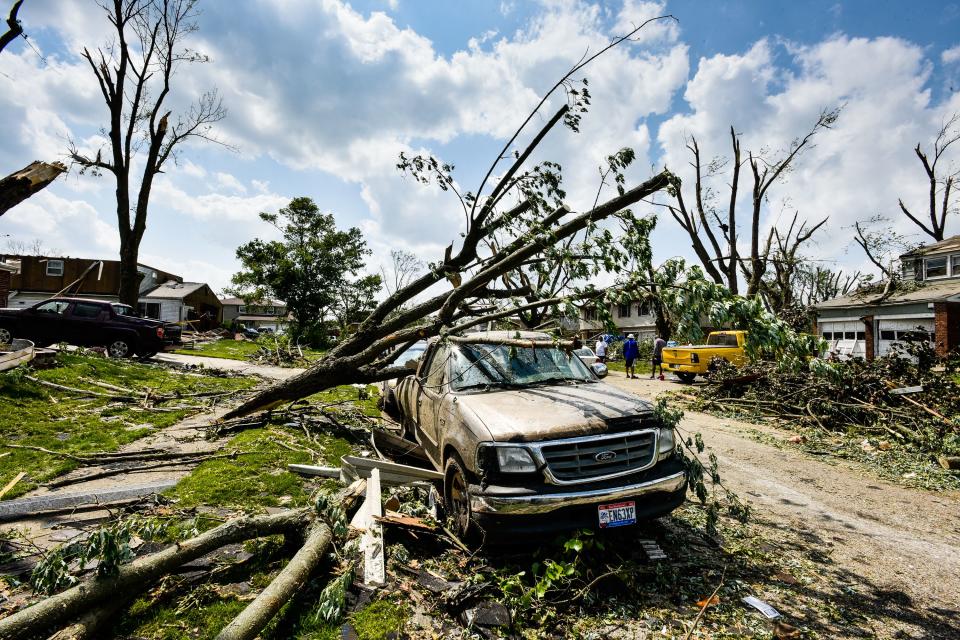 Houses and businesses in Trotwood were damage by tornadoes late Monday night, May 27. Many streets were blocked for downed trees, power lines and debris scattered through the neighborhoods. These homes were on Olive Tree Drive. (WHIO File)