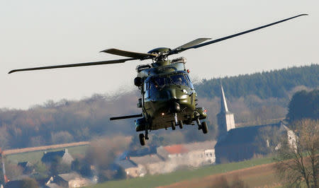 An NH90 helicopter is seen during the Black Blade military exercise involving several European Union countries and organised by the European Defence Agency at the Florennes airbase, Belgium November 30, 2016. REUTERS/Yves Herman