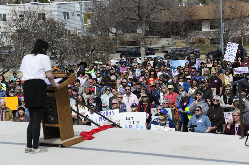 Supporters of Rep. Zooey Zephyr, D-Missoula, gather during rally on the steps of the Montana State Capitol on Monday, April 24, 2023, in Helena, Mont. Republican legislative leaders in Montana persisted in forbidding the Democratic transgender lawmaker from participating in debate for a second week as her supporters brought the House session to a halt Monday, chanting "Let her speak!" from the gallery before they were escorted out. (Thom Bridge/Independent Record via AP)