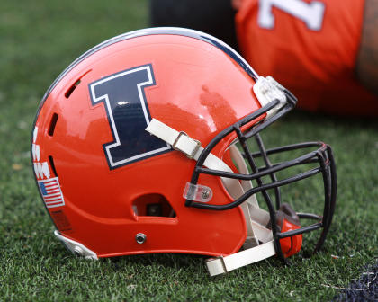 Oct 26, 2013; Champaign, IL, USA; Illinois Fighting Illini helmet on the field before the game against the Michigan State Spartans at Memorial Stadium. (Pat Lovell-USA TODAY Sports)