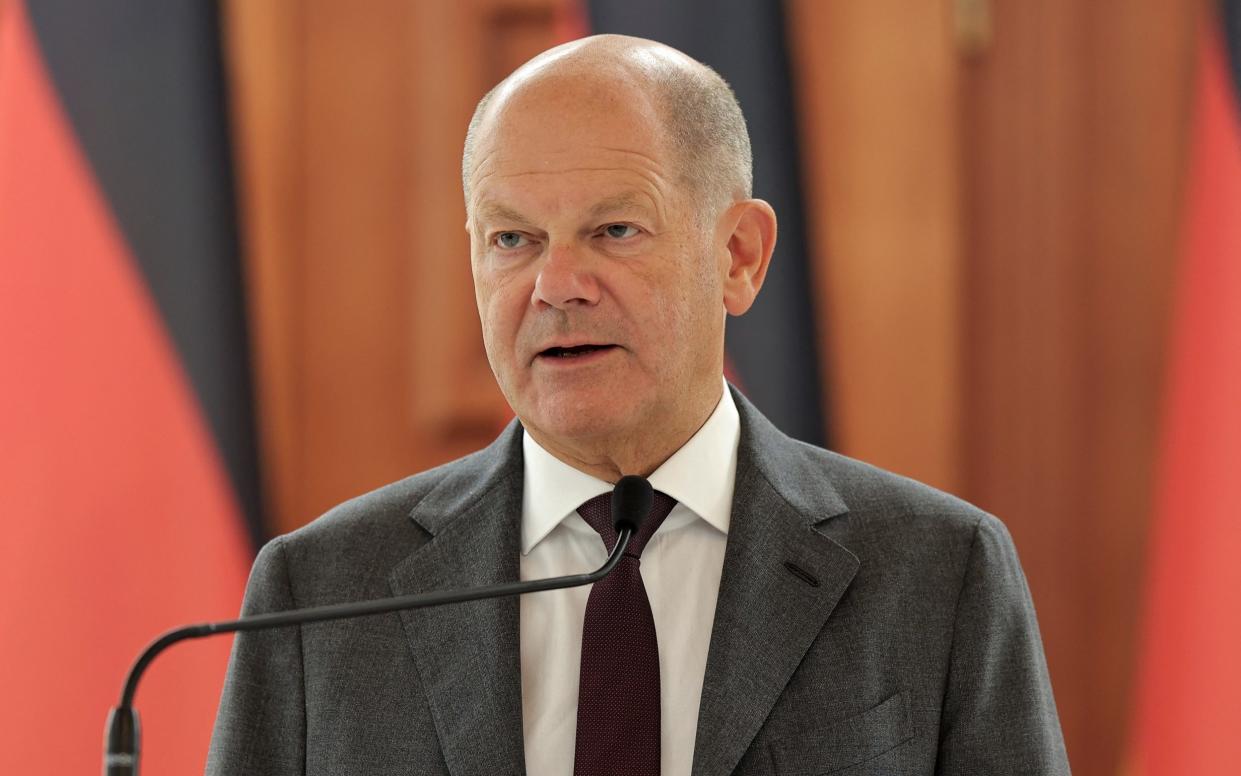 German Chancellor Olaf Scholz speaks during a press conference following talks with Moldovan President Maia Sandu