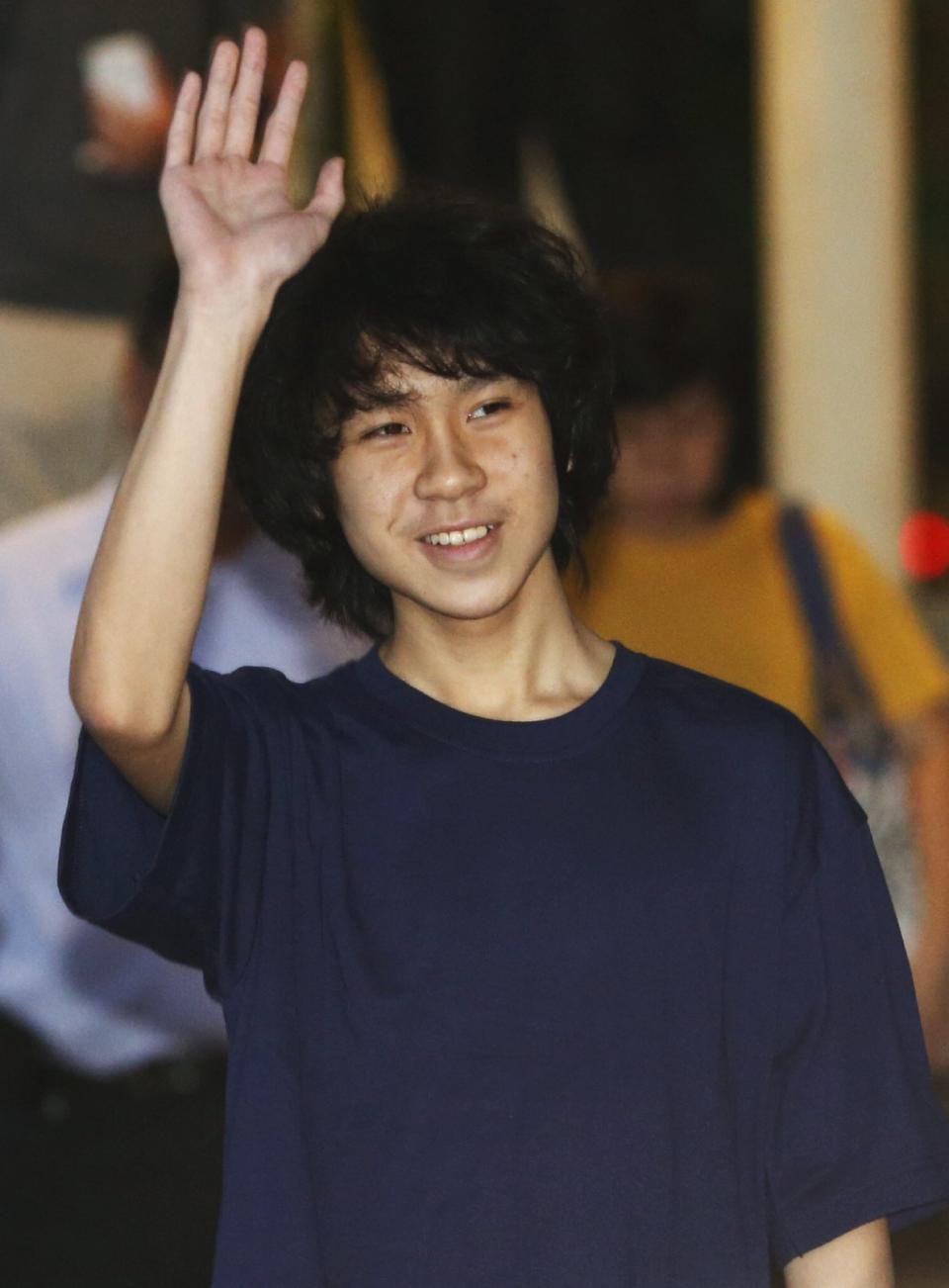 Amos Yee leaves the State Court after his trial in Singapore