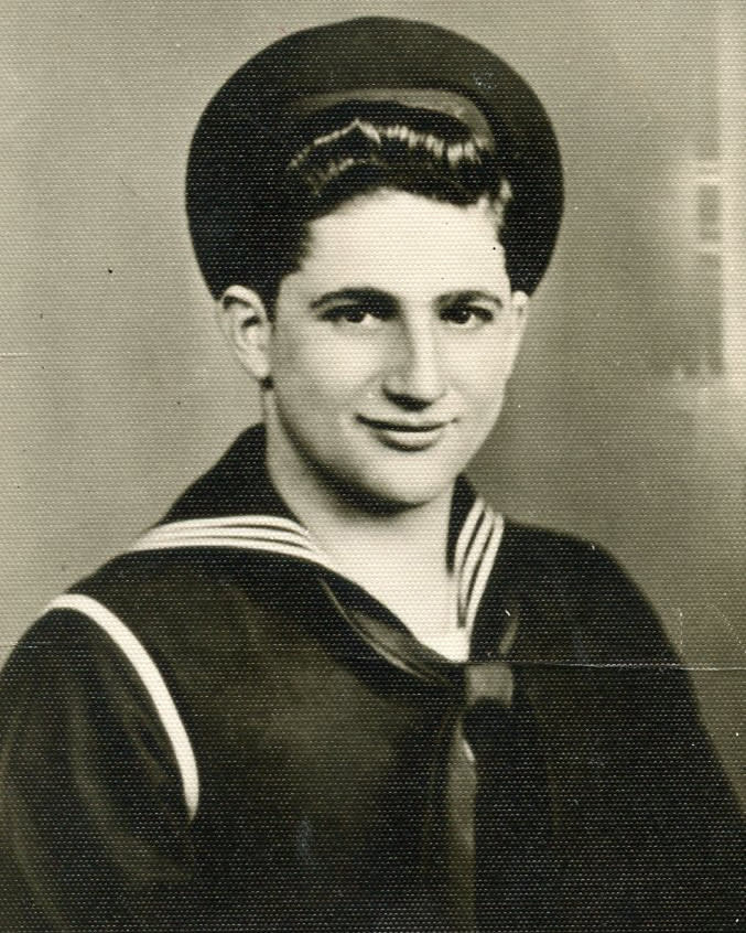 This November 1943 photo provided by his family shows Robert Fleury in his military uniform. Fleury served in World War II and parlayed the skills he learned in the war into a decades-long career with the National Weather Service. He died of complications from the COVID-19 coronavirus at a veteran's home in Scarborough in his longtime home state of Maine at the age of 94 on April 21, 2020. (Family photo via AP)