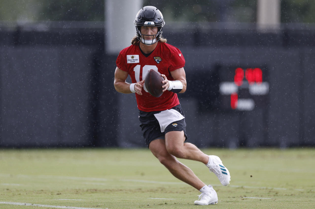 Trevor Lawrence runs a drill at Jaguars OTAs on Monday. (David Rosenblum/Icon Sportswire via Getty Images)