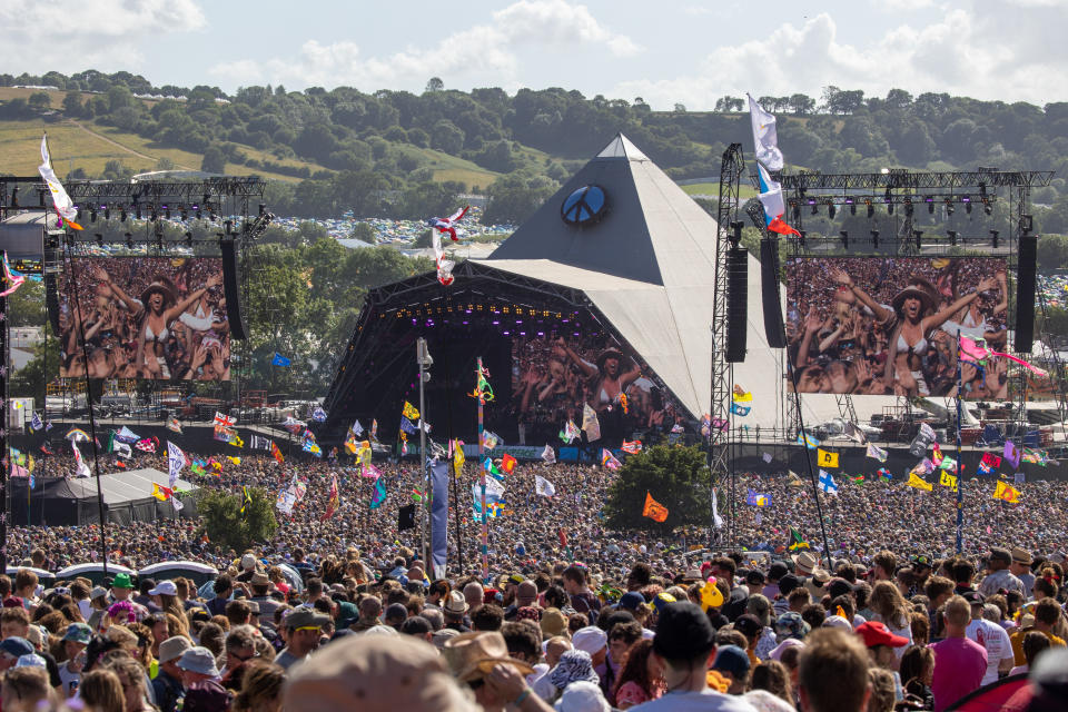 GLASTONBURY, ENGLAND - JUNE 26: Crowds of people gather in front of the main Pyramid Stage to watch Diana Ross perform at the 2022 Glastonbury Festival during day two of Glastonbury Festival at Worthy Farm, Pilton on June 26, 2022 in Glastonbury, England. The festival, founded in 1970, has grown into one of the largest outdoor green field festivals in the world. (Photo by Matt Cardy/Getty Images)
