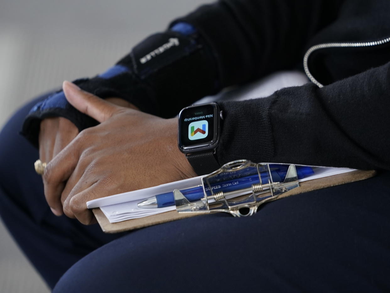 FILE - A job candidate waits for an interview to apply for a financial account health care analyst position at the L.A. Care Health Plan job fair at the company's downtown Los Angeles office on May 21, 2022. More than a half million of the poorest Americans would be left without health insurance under legislation passed by House Republicans that would require people to work in exchange for health care coverage through Medicaid. The bill is unlikely to become law, though, with Democrats strongly opposing the idea. (AP Photo/Damian Dovarganes, File)