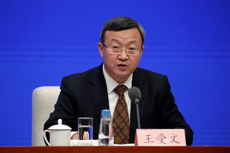 Chinese Vice Commerce Minister and Deputy International Trade Representative Wang Shouwen attends a news conference on the state of trade negotiations with U.S. in Beijing