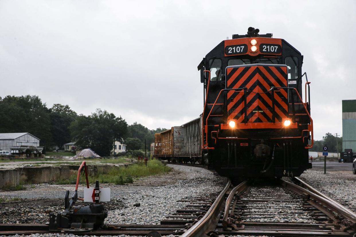 A Grafton & Upton Railroad locomotive leaves the rail yard in Hopedale on Aug. 23, 2021.