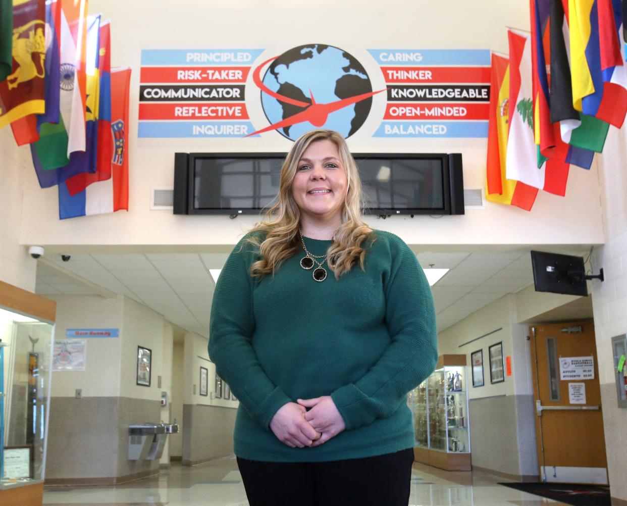 Alana Ryan is The Alliance Review's Robertson Kitchen & Bath Difference Maker for December. She is shown at Alliance Middle School on Tuesday, Nov. 30, 2021 where she is the school's liaison for Families Courts & Intervention.