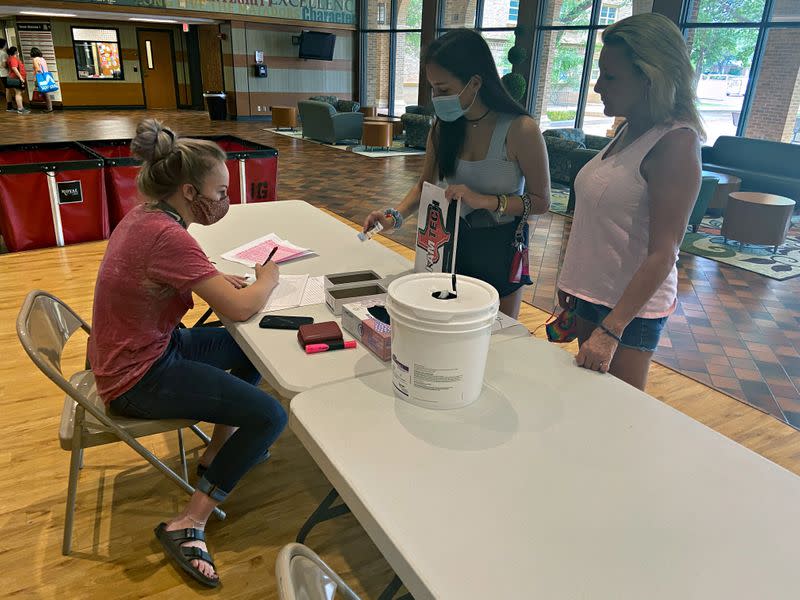 Kaitlyn Abercia is seen moving into her student residence at Gates Hall on the campus of Texas Tech University in Lubbock