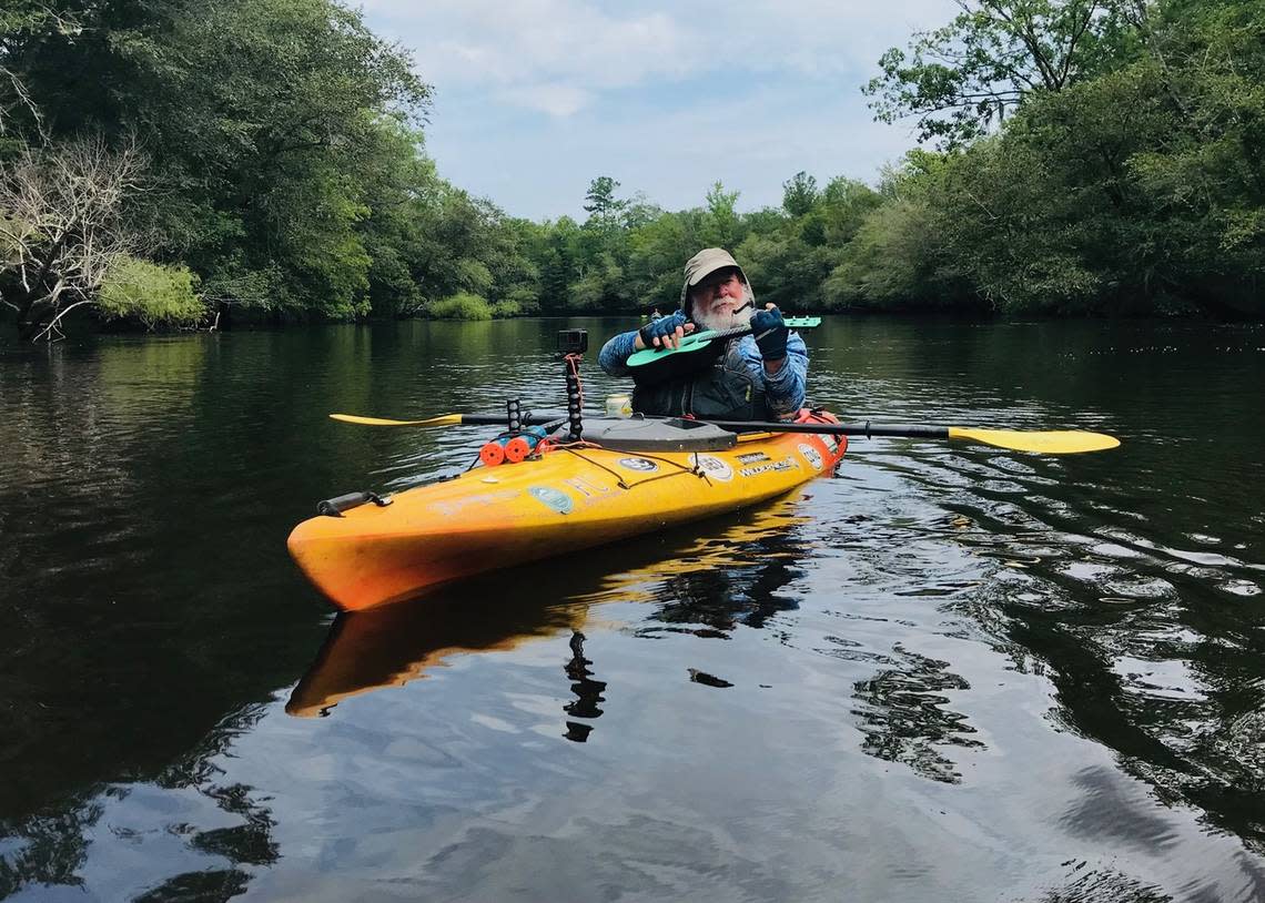 “Paddle faster, I hear … ukuleles?” Kayaker Tom Taylor of Greenville breaks out his waterproof ukulele on a quiet stretch of the Edisto River near Colleton State Park.