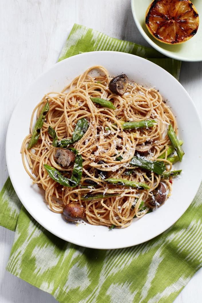 <p>This savory vegetarian-friendly dish is full of robust cremini mushrooms and fresh green beans. And best of all? It only takes 20 minutes to prepare.</p><p><em><a href="https://www.womansday.com/food-recipes/food-drinks/recipes/a58984/spaghetti-grilled-green-beans-mushrooms/" rel="nofollow noopener" target="_blank" data-ylk="slk:Get the Spaghetti with Grilled Green Beans and Mushrooms recipe." class="link ">Get the Spaghetti with Grilled Green Beans and Mushrooms recipe.</a></em></p>