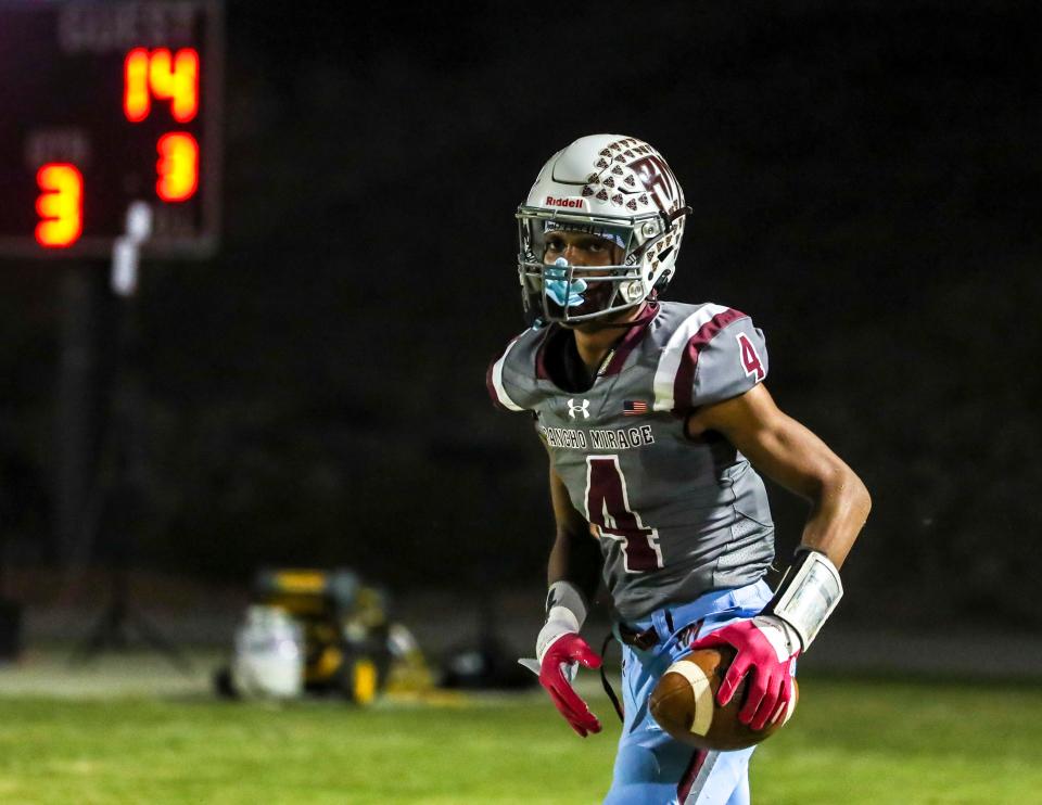 Rancho Mirage receiver Kobee Finnikin, jogging back to the huddle here on Oct. 20, 2023, is a deep threat who was tough to guard in 2023.