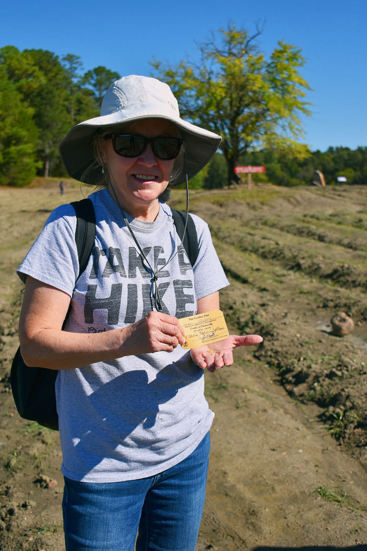 Noreen Wredberg holds the 4.38-carat diamond she found at Crater of Diamonds State Park in Murfreesboro, Ark., on Sept. 23, 2021. (Arkansas State Parks)