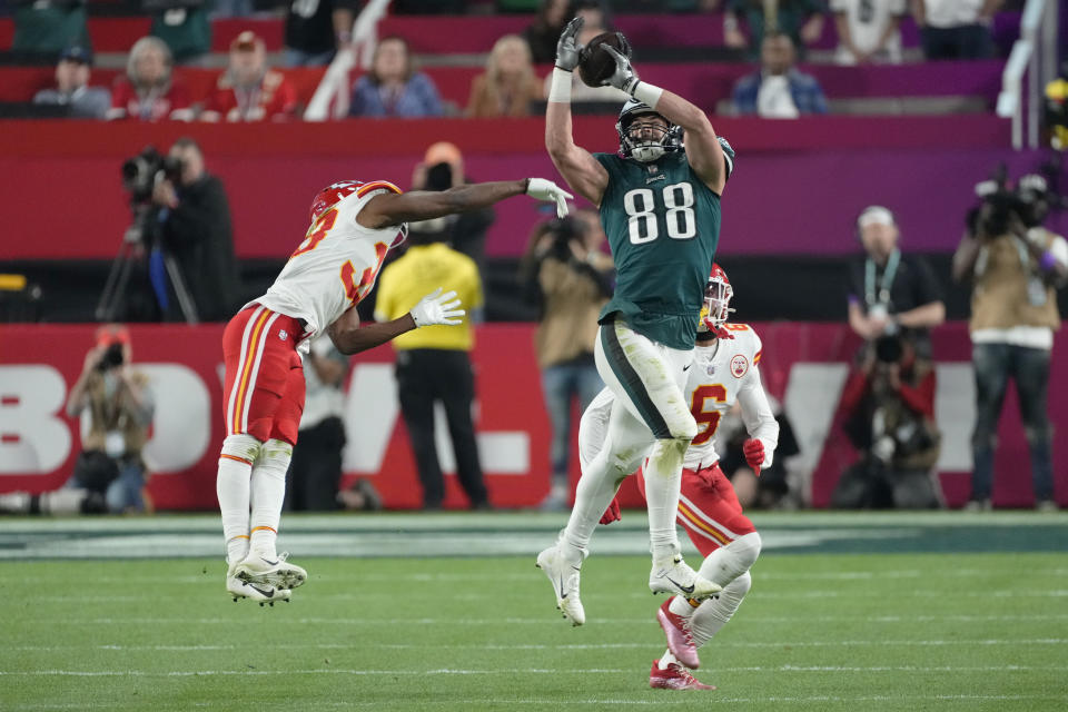 Philadelphia Eagles tight end Dallas Goedert (88) catches a pass as Kansas City Chiefs safety Bryan Cook (6) defends during the second half of the NFL Super Bowl 57 football game, Sunday, Feb. 12, 2023, in Glendale, Ariz. (AP Photo/Ross D. Franklin)