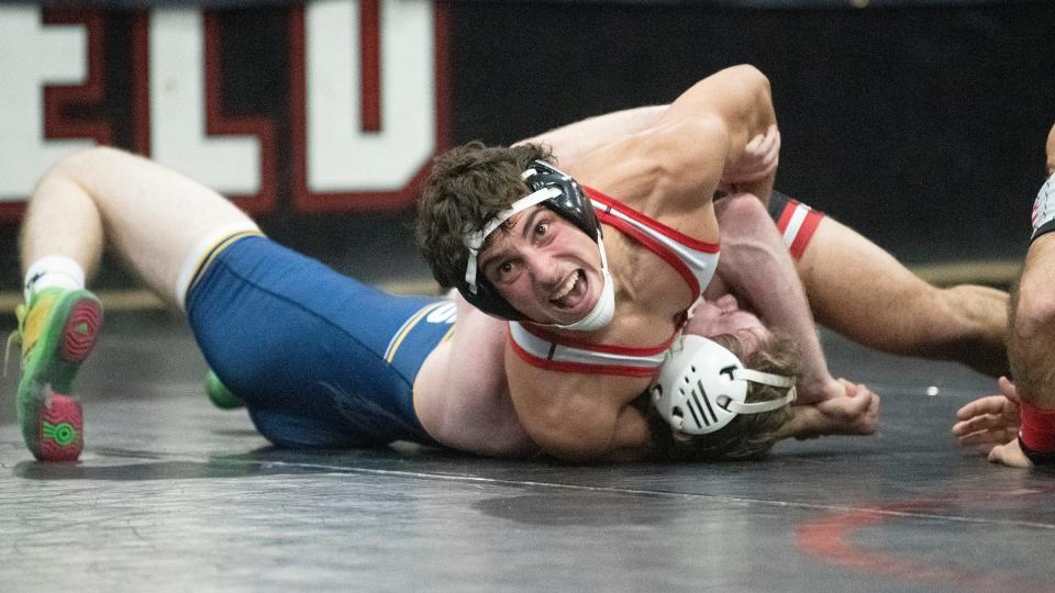 Haddonfield's   James Canuso, top, controls Gloucester's Robert McDowell during the 126 lb. bout of the wresting meet held at Haddonfield Memorial High School on Friday, January 6, 2023. Canuso defeated McDowell, 11-1.