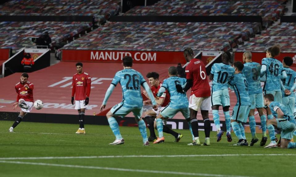 Bruno Fernandes sends a free-kick past the Liverpool wall to score Manchester United’s winner