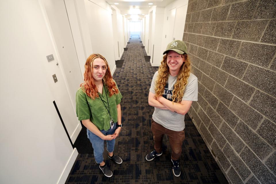 Case worker Abby Coleman and service supervisor Tyler Greer pose for photos at the Magnolia building, a Road Home facility in Salt Lake City, on Wednesday, June 28, 2023. | Scott G Winterton, Deseret News