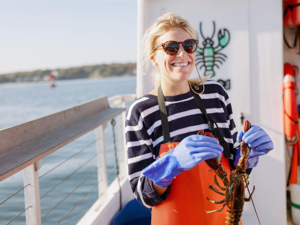 Katherine Parker-Magyar smiling on boat in Maine