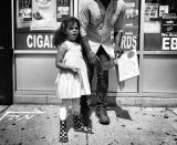 <p>A young girl and her father at a counterprotest against a “free speech” rally staged by conservative activists Aug. 19 in Boston. (Photo: Holly Bailey/Yahoo News) </p>